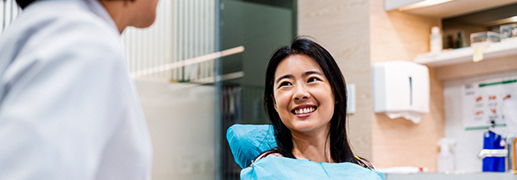 Smiling woman in dental chair