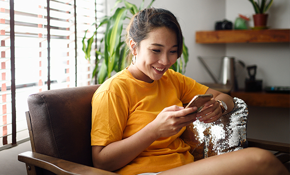 Woman looking at mobile phone